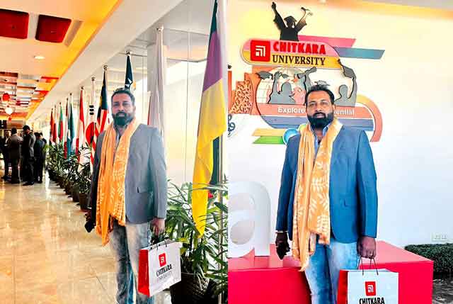 back view of woman wearing a backpack and beanie waiting to cross the road on a busy street at night in New York City, USA